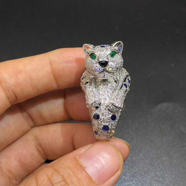 Cartier Diamond Paved Sapphire Onyx and Emerald Platinum Panthere de Cartier Ring